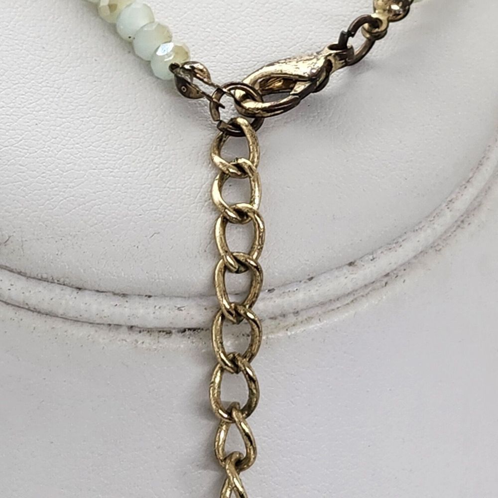 Aldo Sea Foam Crystal Buddha Tassel Necklace - Picture 7 of 7